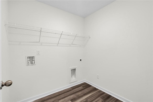 laundry room with dark wood-style flooring, laundry area, hookup for a washing machine, baseboards, and electric dryer hookup