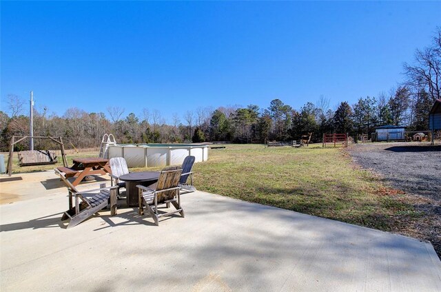 view of patio featuring an outdoor pool