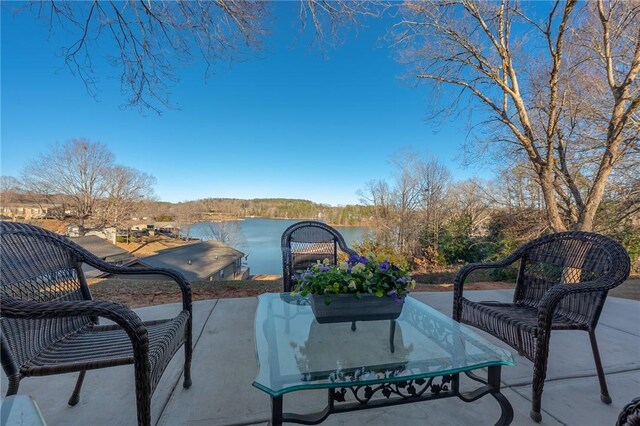 view of patio featuring a water view