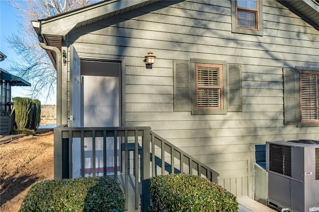 view of home's exterior with cooling unit