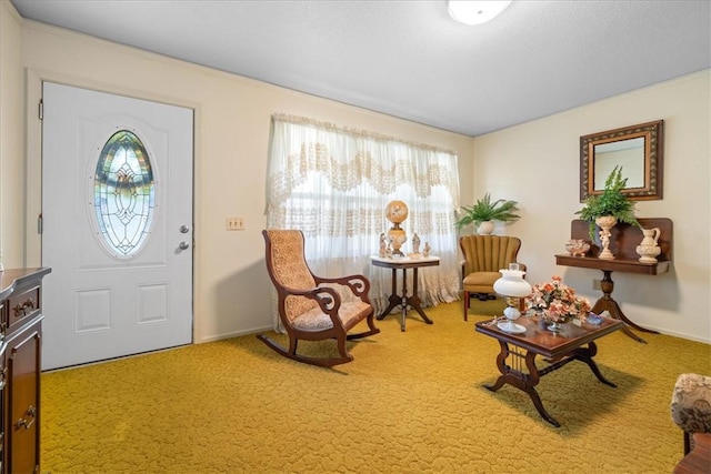 entryway featuring carpet floors