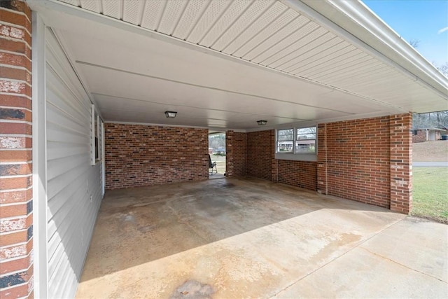 view of patio / terrace featuring an attached carport