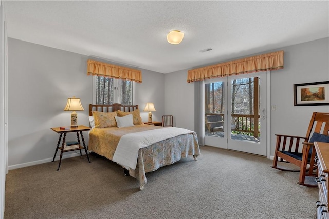 bedroom with access to outside, visible vents, carpet, and multiple windows