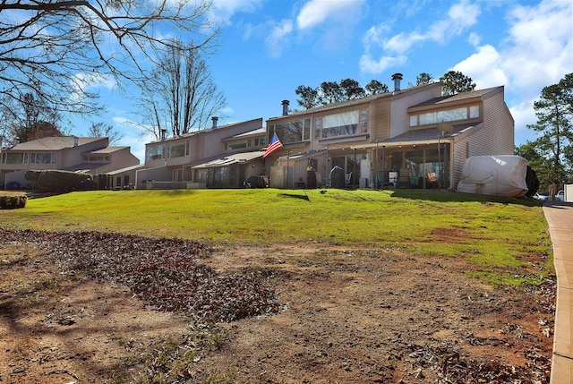 view of front of house with a front lawn