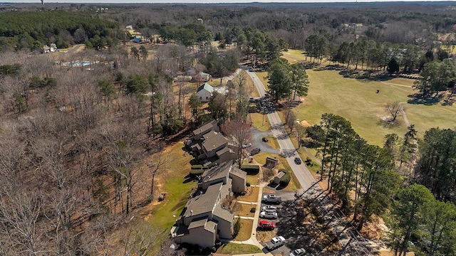 aerial view featuring a forest view