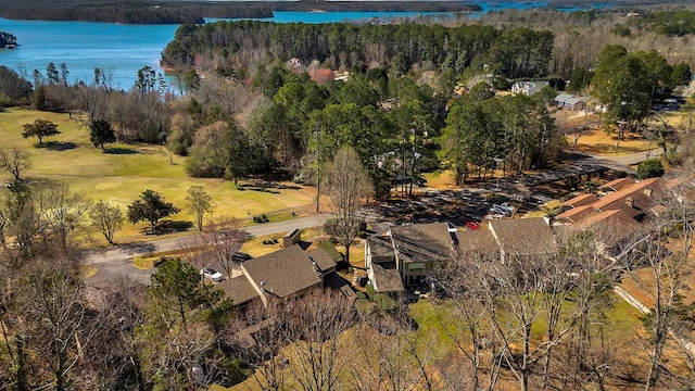 bird's eye view with a water view and a forest view