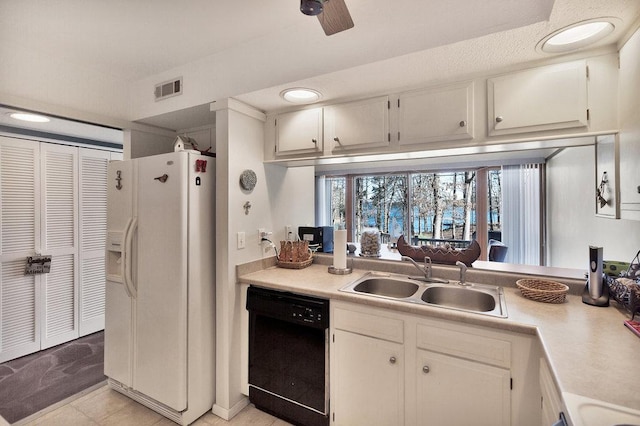 kitchen featuring black dishwasher, white fridge with ice dispenser, a sink, and light countertops