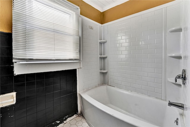 full bath featuring shower / bathtub combination, tile walls, and tile patterned floors