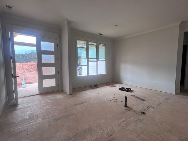 interior space with visible vents and crown molding