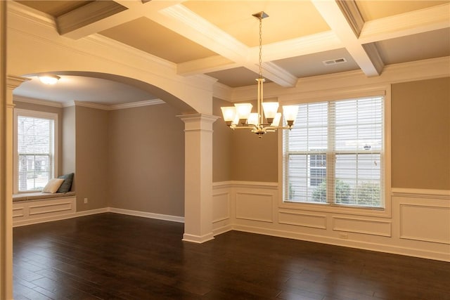 unfurnished dining area with dark wood-style floors, beam ceiling, visible vents, and decorative columns