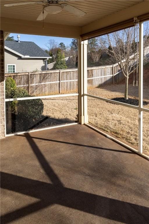 exterior space featuring ceiling fan and a fenced backyard