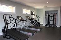 exercise room with recessed lighting