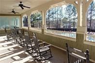 view of patio / terrace featuring ceiling fan and outdoor dry bar