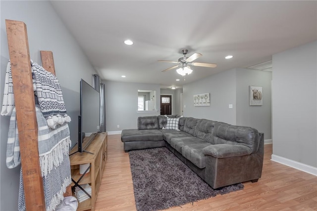 living area featuring recessed lighting, light wood-style flooring, baseboards, and ceiling fan