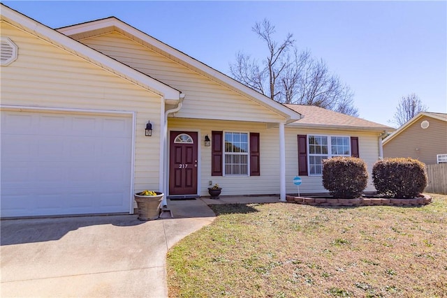 ranch-style house with an attached garage and a front lawn