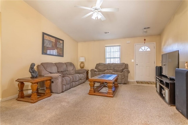 carpeted living area with a ceiling fan, visible vents, and baseboards