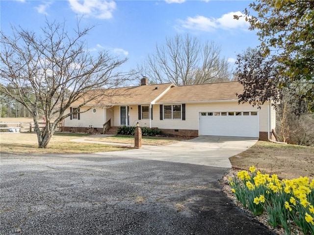 ranch-style home with a front yard, driveway, a chimney, a garage, and crawl space