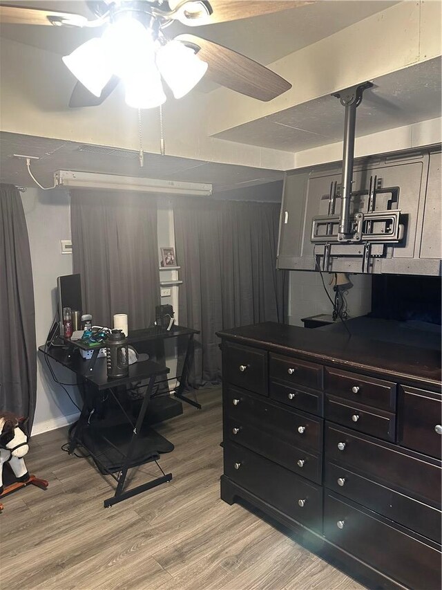 office area featuring a ceiling fan and light wood finished floors