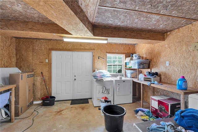 storage area featuring washer and dryer