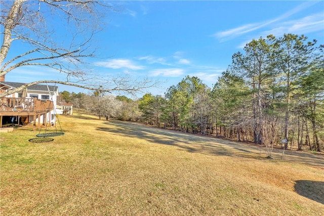 view of yard with a deck