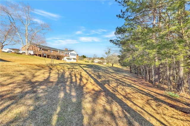 view of yard featuring a deck