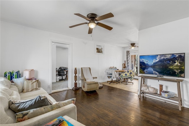 living room with baseboards and wood finished floors