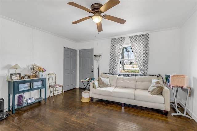 living room with ceiling fan, crown molding, and hardwood / wood-style flooring