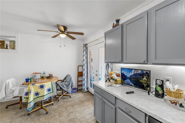 office featuring ornamental molding and a ceiling fan