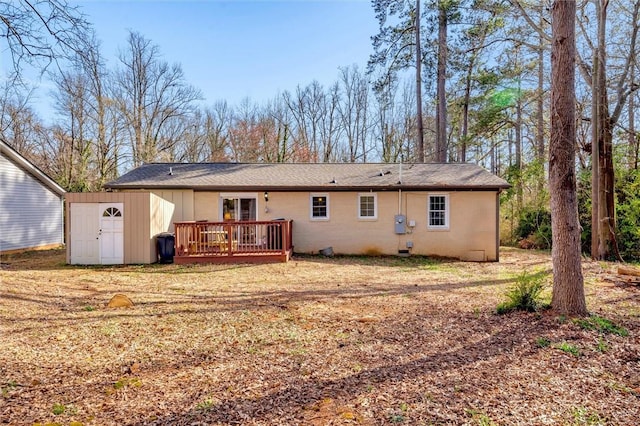 rear view of property with a deck