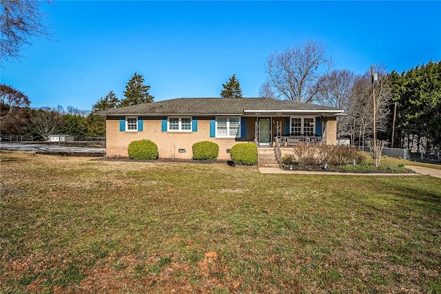 ranch-style home with crawl space, a porch, and a front yard