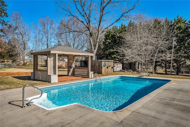 view of pool with a gazebo, a fenced in pool, and a patio area