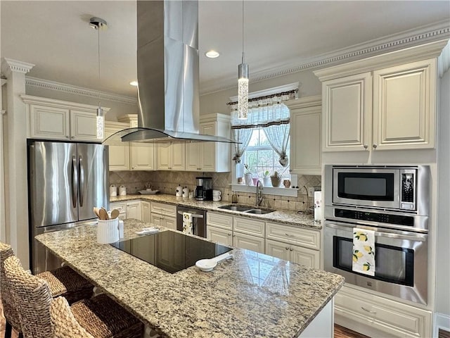 kitchen featuring light stone countertops, a breakfast bar area, appliances with stainless steel finishes, island exhaust hood, and a sink