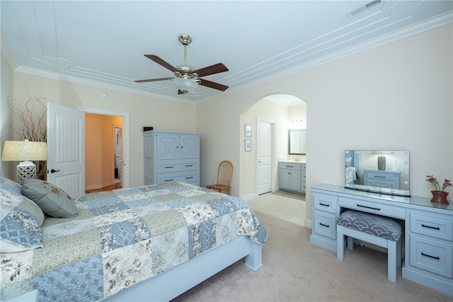 bedroom featuring visible vents, light carpet, arched walkways, and crown molding