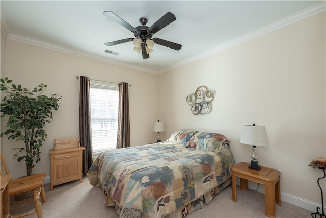 bedroom with baseboards, visible vents, carpet floors, and ornamental molding