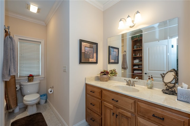 bathroom with vanity, crown molding, toilet, and baseboards