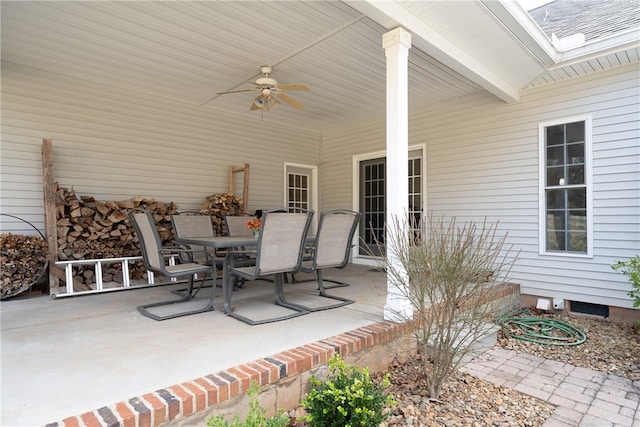 view of patio with ceiling fan and outdoor dining space