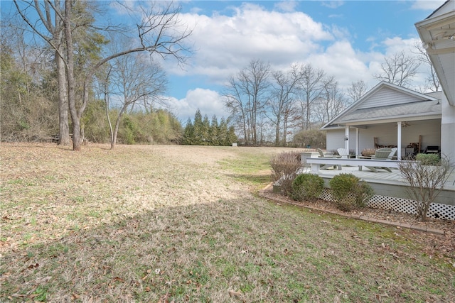 view of yard featuring a deck