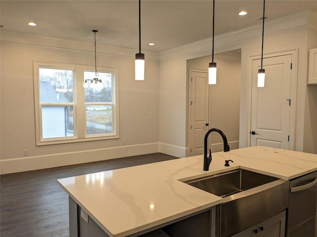 kitchen featuring light stone counters, baseboards, dark wood finished floors, a sink, and crown molding