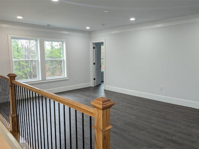 interior space with visible vents, dark wood-style floors, recessed lighting, crown molding, and baseboards