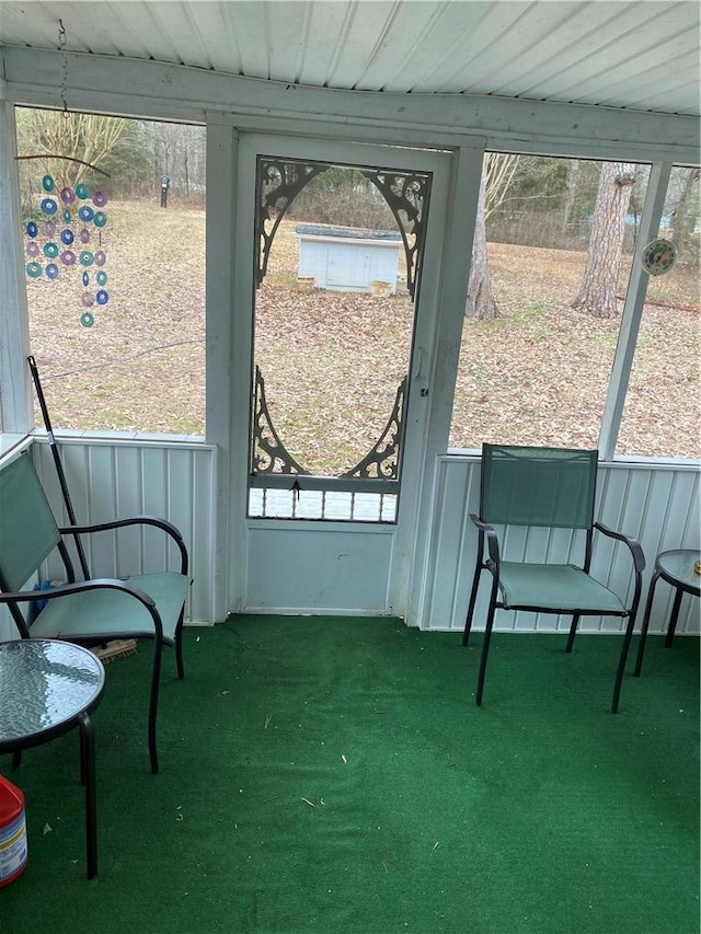 sunroom / solarium with wood ceiling