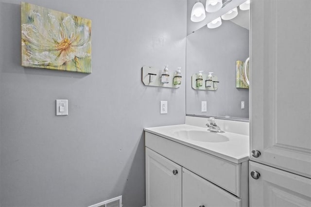 bathroom with visible vents and vanity