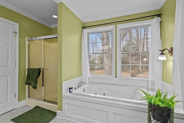 bathroom featuring a tub with jets, baseboards, a stall shower, ornamental molding, and tile patterned floors