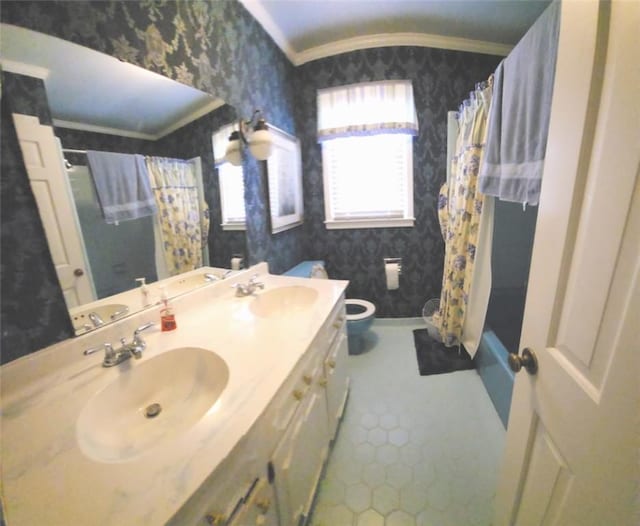 full bathroom with wallpapered walls, a shower with shower curtain, and a sink