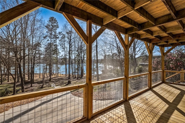 wooden terrace with a water view