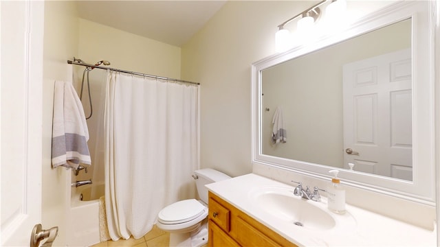 full bath featuring tile patterned floors, shower / bath combo with shower curtain, toilet, and vanity