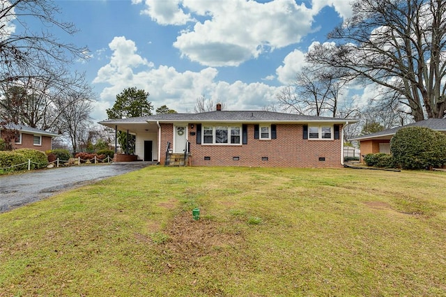 single story home with an attached carport, a front yard, driveway, and crawl space