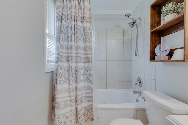 bathroom featuring toilet, shower / tub combo with curtain, and crown molding