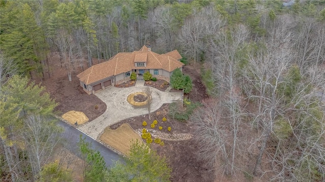 aerial view featuring a view of trees