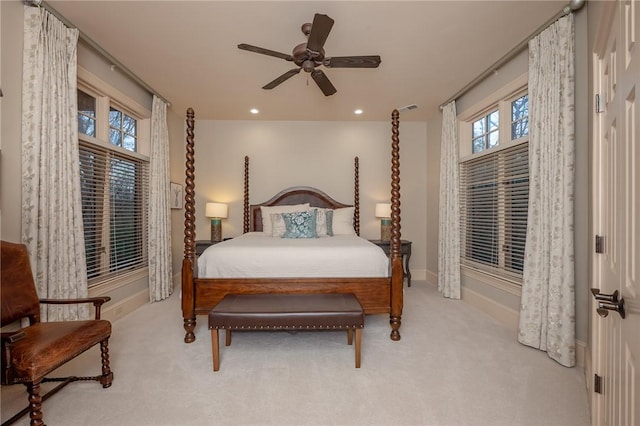 bedroom with multiple windows, carpet flooring, and visible vents