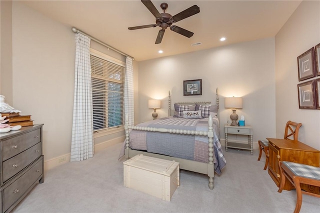 bedroom featuring baseboards, visible vents, recessed lighting, ceiling fan, and light carpet